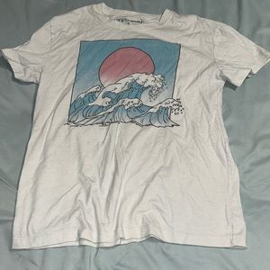 White shirt with an ocean on it